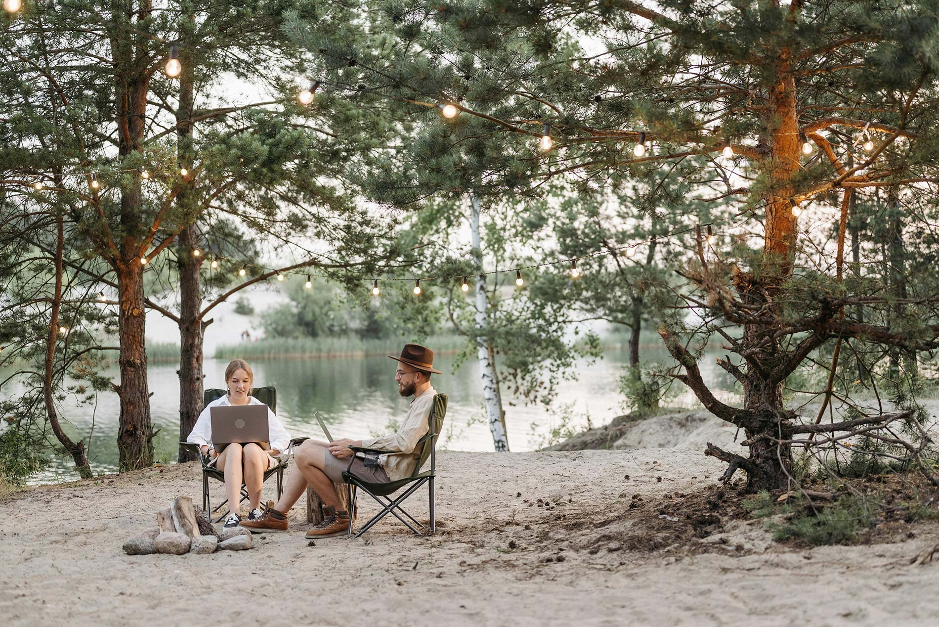 couple using laptops on wireless internet plan