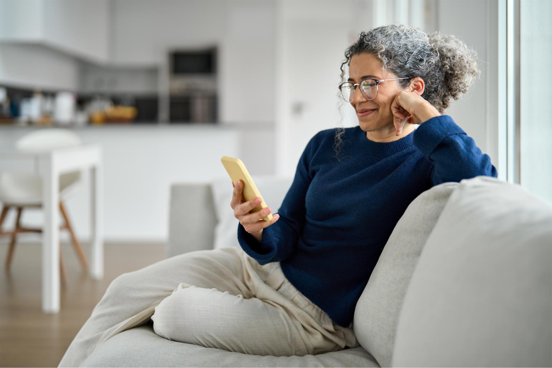 woman on a phone connected by a 5g data plan