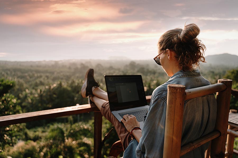 woman works remotely with a great view via 5g internet